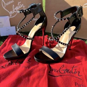 Louboutin Choca Lux black leather and spikes. Only worn ONCE! Perfect condition.